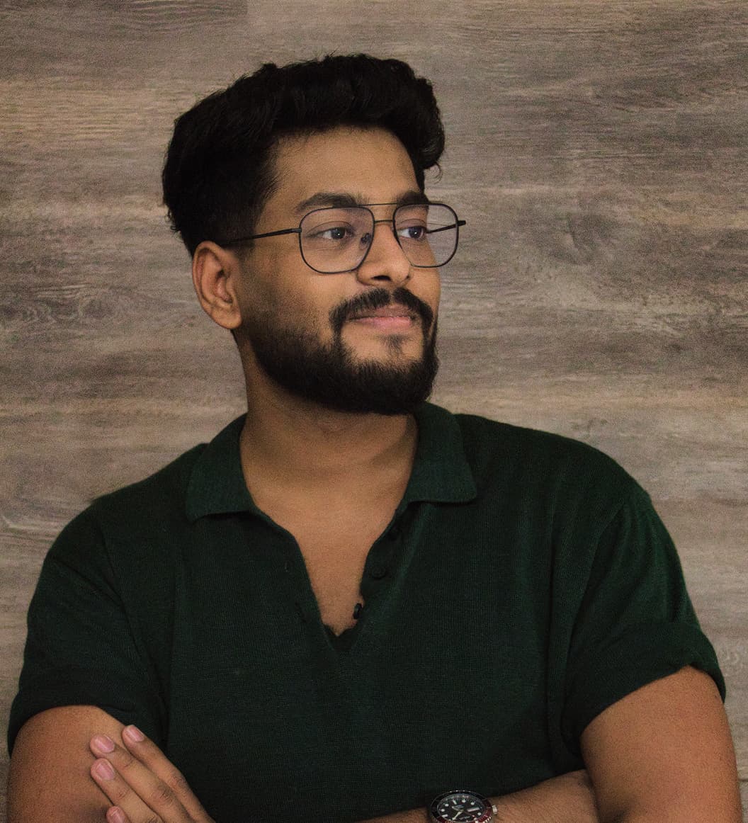 Harsh Srivastava, arms crossed, looking off to the side